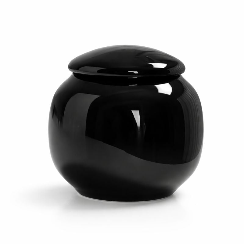 zwarte mini urn - ontworpen om een gedeelte van de as te bewaren