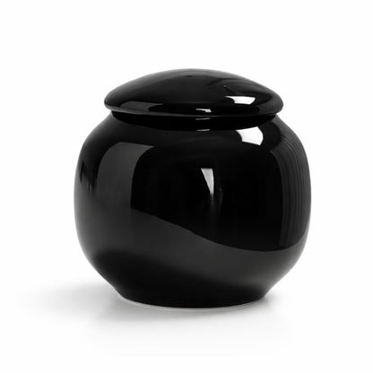 zwarte mini urn - ontworpen om een gedeelte van de as te bewaren