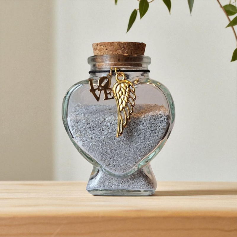 herdenkingsflesje  kan gevuld worden met een klein beetje as, een plukje haar, snorhaartjes of andere kleine aandenken