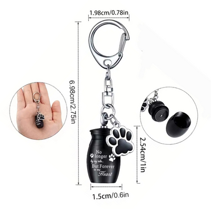 sleutelhanger met mini urn met tekst "No longer by my side, but forever in my heart"